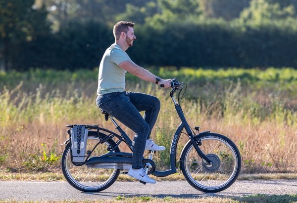 Cycling with a unique Van Raam bike with two wheels Van Raam