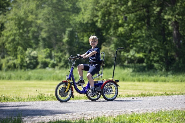 Battery powered outlet trike for toddlers