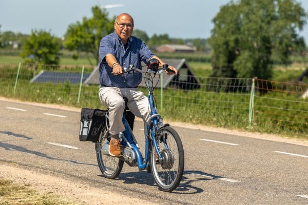 old man on electric bike